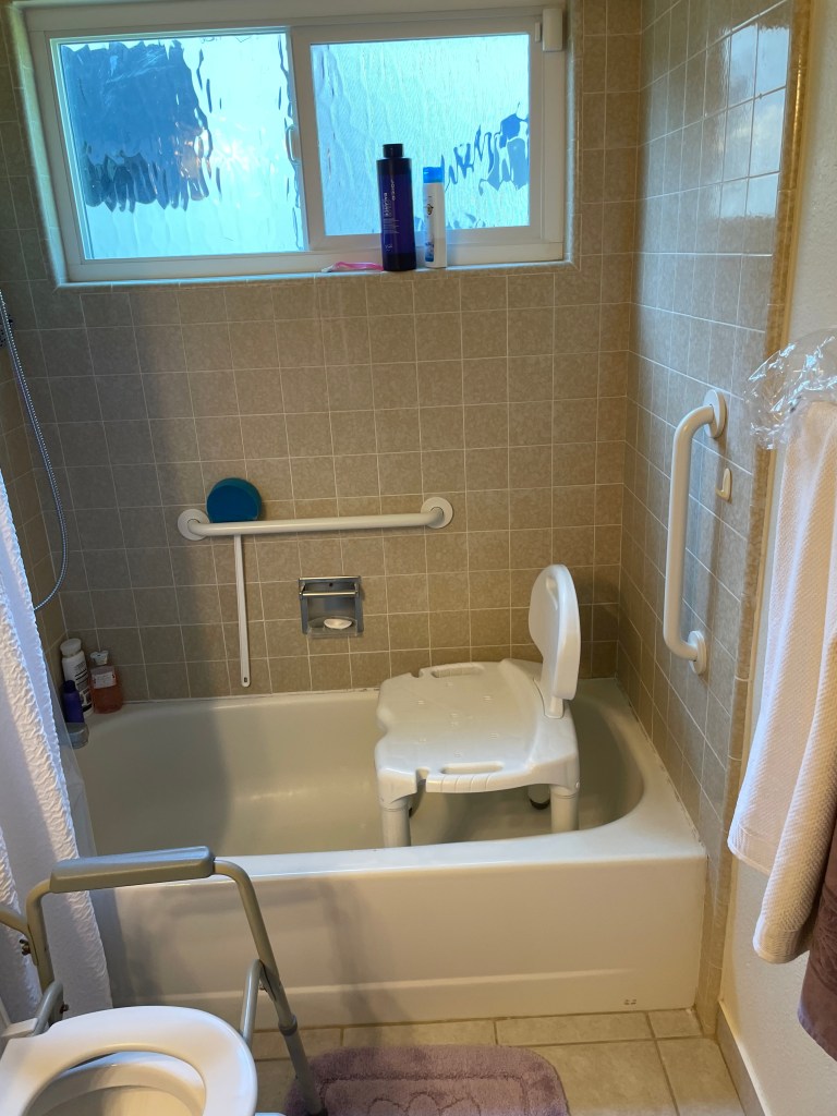 This image shows the Before section of a tub to walk in shower conversion as part of our bathroom remodeling services.